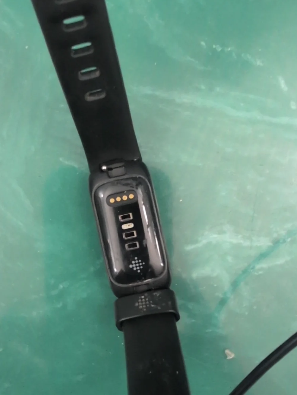 Black FitBit Inspire 3 with USB Charger And Extra Green Band
